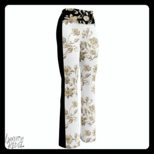 Flare leggings featuring a white base with an elegant cream floral pattern and black accents, named Elegance Unveiled White Flare Leggings, part of the Luxury Rebel collection.