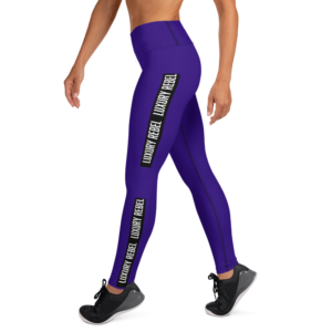 Luxury Rebel High-Waisted Leggings, featuring a bold deep purple color with a black stripe down the leg displaying "Luxury Rebel" in white. These high-waisted leggings provide a supportive and comfortable fit, perfect for workouts or casual wear.