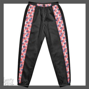 Joggers featuring a bold red, white, and blue wave pattern with black center panels, named Patriot Pulse Joggers, part of the Luxury Rebel collection.