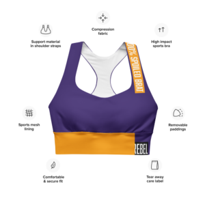 A woman models the Luxury Rebel Sports Bra, featuring a deep purple design with an orange strap that reads "100% Spoiled" and a black waistband that says "Luxury Rebel" in white. This sports bra offers a supportive and stylish fit, perfect for workouts or casual wear.