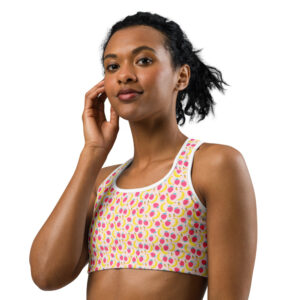 A sports bra adorned with a fun and vibrant strawberry and banana pattern, ideal for adding a playful touch to your workout wardrobe.