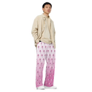 Image of wide-leg pajama pants featuring a whimsical pattern of pink melting ice cream scoops on a soft gradient background transitioning from white to pink. The pants have a relaxed fit, designed for comfort, making them perfect for cozy nights or lazy mornings.