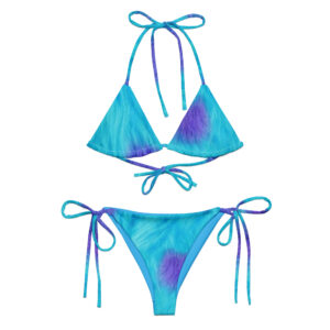 This bikini set includes a teal-and-purple tie-dye triangle top with string ties and matching adjustable string bikini bottoms. Inspired by a playful monster theme.