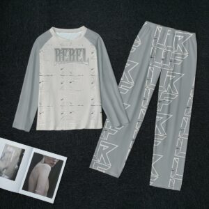 A lounge set featuring a long-sleeve top and matching joggers with a grey base, bold 'Rebel' typography, and white geometric accents. The set is made from soft, breathable fabric, perfect for lounging or casual wear.