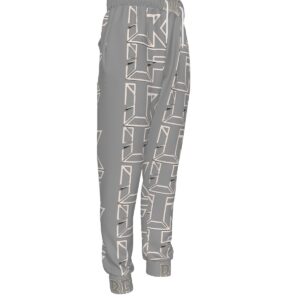 A pair of joggers featuring a grey base with bold 'Rebel' typography in white. The joggers include an elastic waistband, ankle cuffs, and a relaxed fit for a comfortable and stylish streetwear look