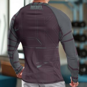 A long-sleeve compression shirt with a bold abstract design in burgundy and teal. Designed with breathable, moisture-wicking fabric and a snug fit, it’s perfect for athletic activities and stylish performance wear.