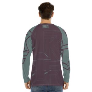 A long-sleeve tee featuring a bold abstract design in burgundy and teal. The shirt has a relaxed fit and soft fabric, offering a stylish and comfortable option for casual or streetwear looks