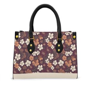 Handbag from the Blooming Ember collection featuring a floral design in warm plum and earthy tones. Durable and spacious for all-day wear.