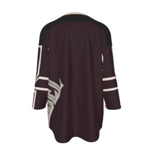 An oversized hockey jersey from the Plasma Haze Collection featuring bold geometric patterns in deep maroon and neutral tones.