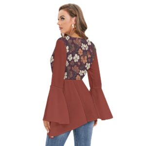 A flowy boho blouse from the Blooming Ember Collection with bell sleeves, a maroon floral print bodice, and an asymmetrical hem for a modern, flattering style.