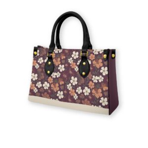 Handbag from the Blooming Ember collection featuring a floral design in warm plum and earthy tones. Durable and spacious for all-day wear.