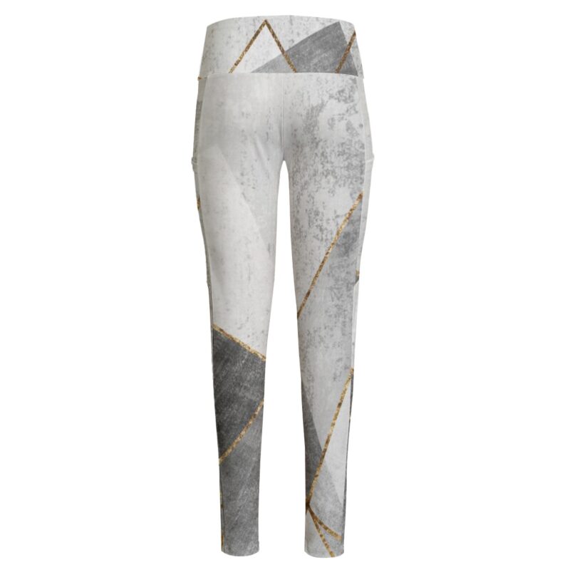 Step into elegance with the Gold-Trimmed Geometric Leggings, featuring a modern marble-like design in muted tones highlighted by gold geometric lines. Crafted for ultimate comfort and versatility, they’re perfect for yoga, fitness, or a chic athleisure look.