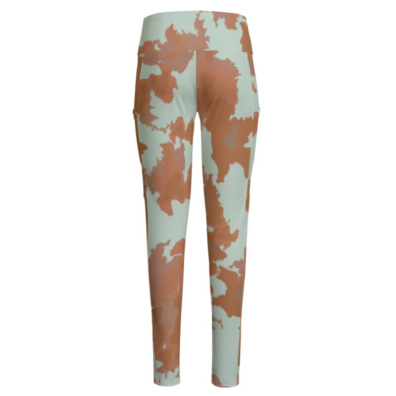 Stay cozy and fashionable with the Earth-Tone Cow Print High-Waisted Leggings. These leggings combine earthy tones and a chic cow print for a standout addition to your activewear collection.
