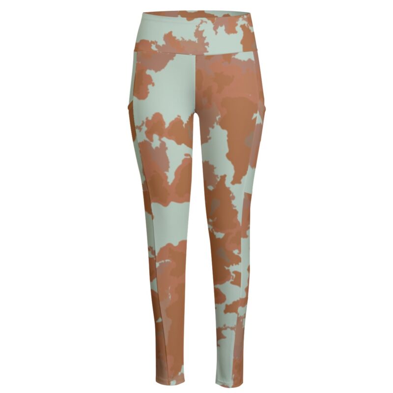Stay cozy and fashionable with the Earth-Tone Cow Print High-Waisted Leggings. These leggings combine earthy tones and a chic cow print for a standout addition to your activewear collection.