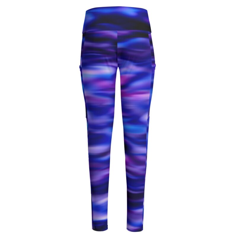 Channel the beauty of the aurora with these striking leggings. The smooth blend of vibrant purples and blues creates a dreamy, otherworldly vibe, while the high-waisted design ensures a flattering and secure fit. Ideal for workouts or casual wear.