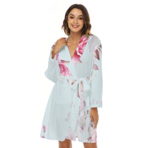 Wrap yourself in floral charm with the Elegant Bloom Robe. Its gentle pastel tones and romantic rose design make it a luxurious addition to your relaxation wardrobe. Soft, airy, and effortlessly chic.