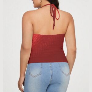 Turn up the charm with this Red Lace-Trim Halter Top, featuring a plunging neckline and soft ruching for a figure-flattering fit. Whether paired with jeans for a casual look or a skirt for an evening out, this top is versatile and chic.