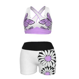 A dynamic sports bra and shorts set featuring purple butterflies and white daisies with black outlines, designed for active comfort and bold style.