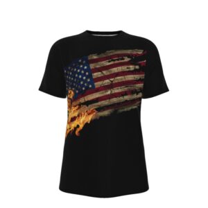 A black t-shirt with a distressed American flag printed across the front. Flames rise from the lower left corner of the flag, creating a visual of fire and endurance. The design represents strength, sacrifice, and national pride.