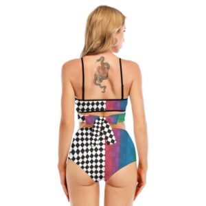 A stylish two-piece bikini featuring a cross-strap top with a rainbow and black-checkered pattern, paired with high-waisted matching bottoms. The swimsuit combines bold colors and edgy lines, creating a standout, confident look.