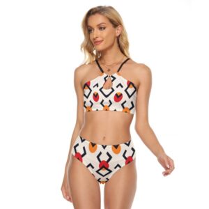 A woman wearing a high-neck cami keyhole bikini with a retro geometric print in black, red, and orange shapes on an ivory background. The swimsuit includes high-waisted bottoms and cross-back tie straps.