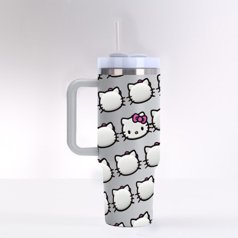 Gray 40oz tumbler with all-over repeating Hello Kitty face pattern, gray handle and light blue straw lid